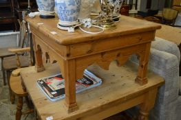 A pine coffee table.