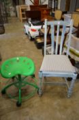 A bright green typists chair and a painted dining chair.