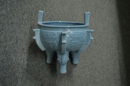 An unusual Chinese blue glazed three footed censer.