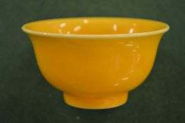 A small Chinese yellow ground bowl.
