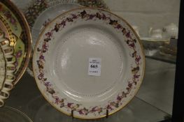 A pearlware circular plate with decorated border.