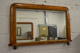 A Victorian walnut overmantle mirror.