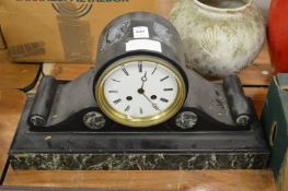 A slate mantel clock.