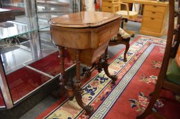 A 19th century mahogany combination games/work table.