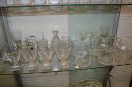 Cut glass wine glasses, wine glass rinsers and other glassware.
