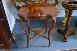 A decorative rosewood centre table, the central panel decorated with a cock and hen pheasant in