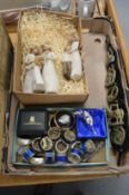 A nativity set, horse brasses and other items.