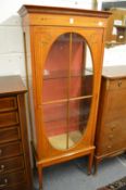 A good satinwood and painted standing single door display cabinet.