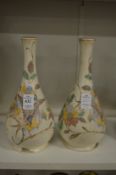 A pair of Gouda Holland bottle vases.