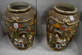 A large decorative pair of satsuma vases.