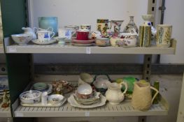 Two shelves of decorative china.