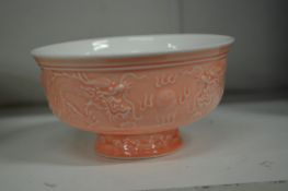 An unusual Chinese pink ground porcelain pedestal bowl.