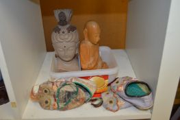 Pottery bust of an Eastern female deity and other items.