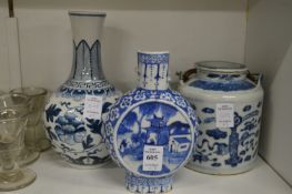 Two Chinese blue and white vases and a teapot.