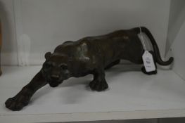 A good bronze prowling lion.