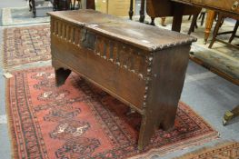 A 17th century oak six plank coffer of small size.