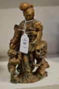 A good Chinese carved soap stone group of a women with a boy by her side.