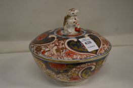 A Japanese Imari bowl and cover.