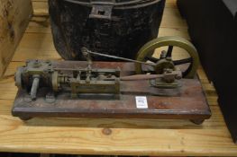 Brass and mahogany model of a stationary engine.