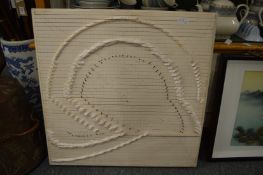 A cream painted sectional plaster and wooden framed sculpture with pin head decoration, formally