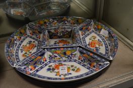 An Oriental porcelain lazy susan/ hors d'oeuvres set.