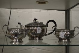 A plated three piece tea service.