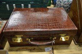 A good crocodile leather vanity case.
