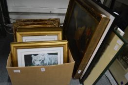 A quantity of paintings and prints.