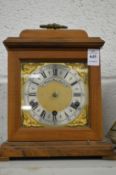 A Georgian style mantle clock by Thwaites and Reed, London.