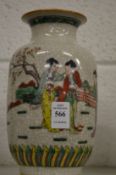 A Chinese crackle glaze vase painted with female figures.