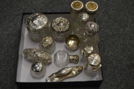 A good collection of cut glass and silver topped dressing jars, scent bottles and other items.