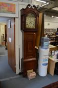 A 19th century mahogany large longcase clock with eight-day movement and painted arch dial.