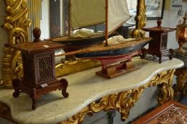 A pair of Chinese carved wood pagoda style table lamps.