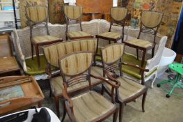 An Edwardian mahogany seven piece salon suite comprising, settee, pair of armchairs and four