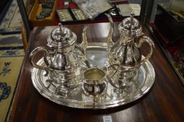 A modern four-piece plated coffee service.