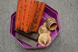 A Chinese red lacquer jar and other items.