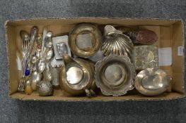 A collection of small silverware to include a tea caddy, boot shaped pin cushion, ink well etc.