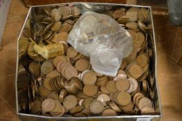 A large quantity of pre decimal half pence pieces and other coins.
