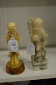 Two Chinese carved hardstone figures of deities.