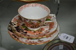 A Royal Crown Derby porcelain trio.