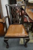 A Georgian style mahogany elbow chair.