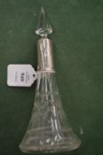 A good cut glass scent bottle with silver mount.