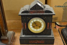 A slate mantel clock.