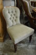 A Victorian button upholstered bedroom chair.