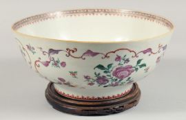 A SAMSON FAMILLE ROSE PORCELAIN PUNCH BOWL, together with a hardwood stand, the exterior painted