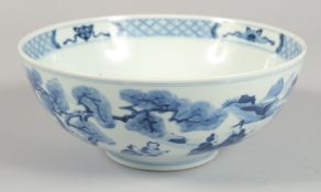 A CHINESE BLUE AND WHITE PORCELAIN BOWL, the exterior painted with a landscape scene with figures in