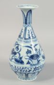 A CHINESE BLUE AND WHITE PORCELAIN VASE, the body painted with ducks and aquatic flora, 31cm high.