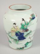 A CHINESE FAMILLE VERTE PORCELAIN JAR, painted with figures by water and lilies, 15.5cm high.
