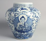 A LARGE CHINESE BLUE AND WHITE PORCELAIN JARDINIERE painted with buddhistic figures, as well as