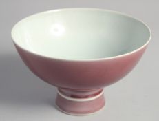 A CHINESE PEACH BLOSSOM GLAZE PEDESTAL BOWL, the interior of the base bearing six-character mark.